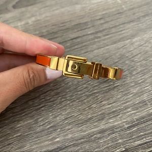 Michael Kors orange buckle bangle